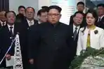 kim-jong-un-dan-ri-sol-ju-1213.jpg