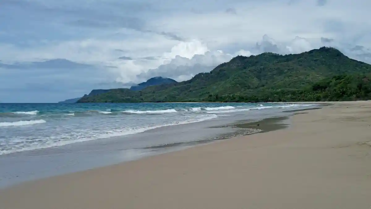 Pantai Indah Kokang dan Legenda Batu Kepala Anjing