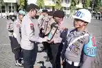 Kapolres-Situbondo-AKBP-Rezi-Dharmawan-saat-melakukan-pemecatan-tidak-hormat-tiga-anggota-polisi.jpg