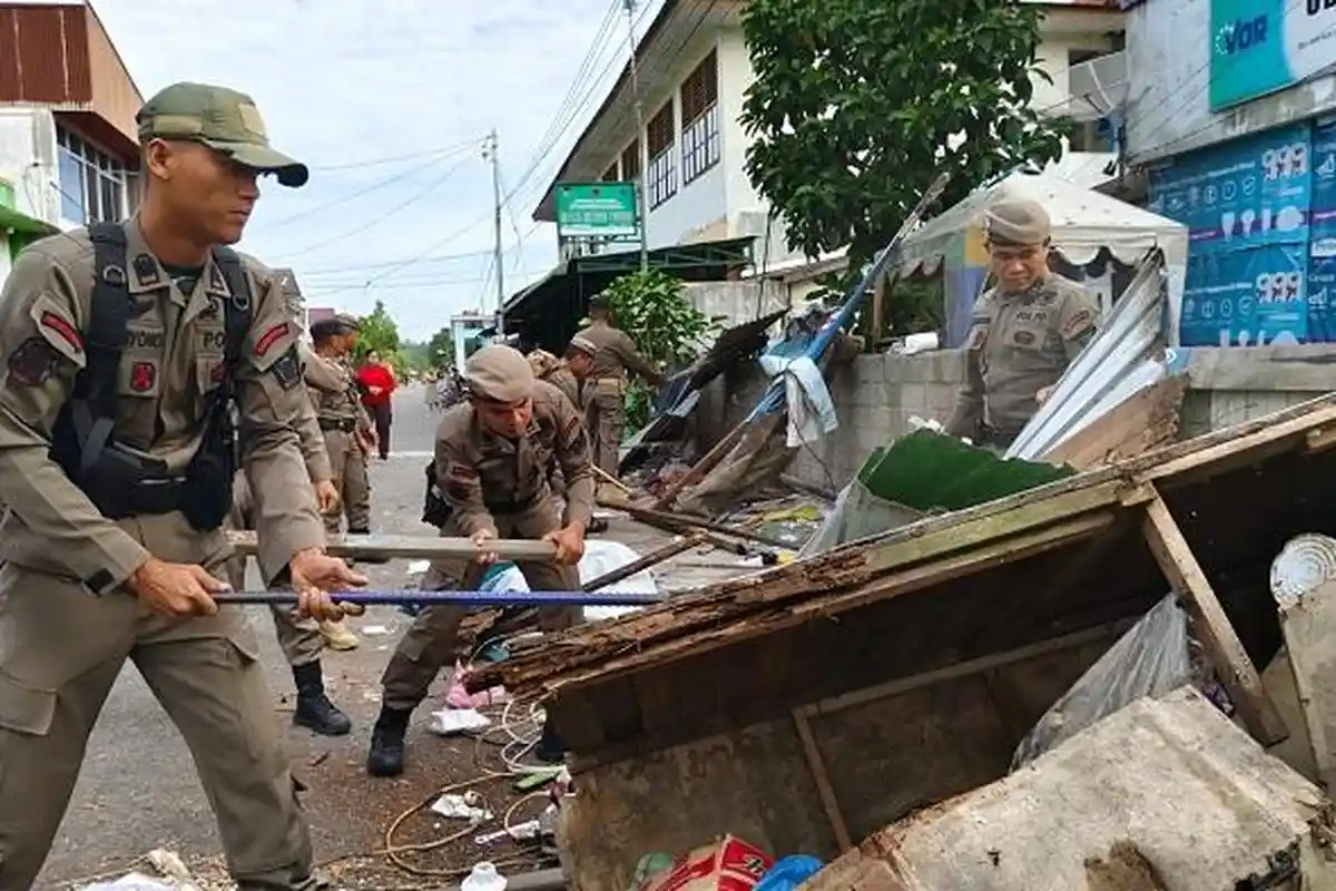 POPULER PADANG:Bangunan Liar Dibongkar Satpol PP dan 402 Guru Non ASN Diikutkan BPJS Ketenagakerjaan