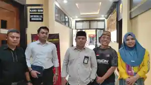 HAK-CIPTA-Zainuddin-Hadjarati-dan-Kuasa-Hukumnya-saat-memenuhi-panggilan-Penyidik.jpg