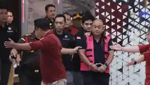 20260603-dadan-hindayana-pakai-rompi-pink-kejagung-korupsi-bgn.jpg