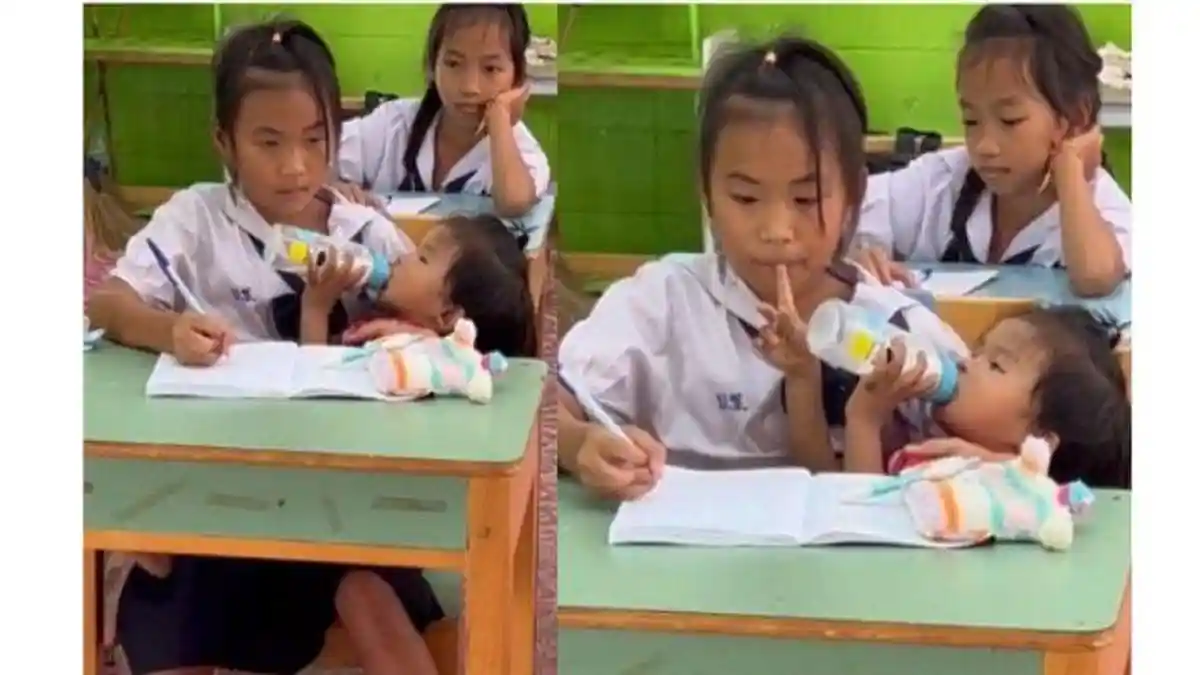 Ibu Sibuk Kerja, Bocah SD Terpaksa Gendong Sambil Beri Susu Adiknya saat Ujian, Guru Ikut Mendukung