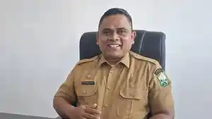 Kepala-DPMGP-KB-Kabupaten-Bireuen-Musni-Syahputra-SIP-MEc-Dev.jpg