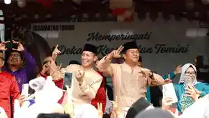 Bupati-Bolsel-Iskandar-Kamaru-dan-Wakil-Bupati-Deddy-Abdul-Hamid-hadiri-HUT-ke-10-Kecamatan-Tomini.jpg