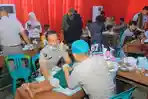 Polda Lampung Gelar Khitan Massal dan Bagikan Ratusan Sembako di May Day