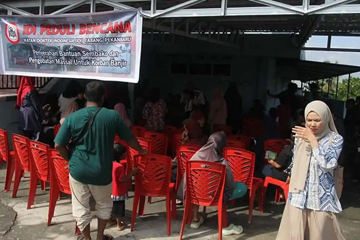 FOTO : IDI Pekanbaru Gelar Pengobatan Massal di Lokasi Banjir Rumbai - pengobatan-idi-pku.jpg