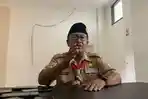 Bupati-Cianjur-Herman-Suherman-pake-baju-pramuka.jpg