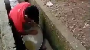 Viral-Penjual-Roti-Canai-Cuci-Wajan-di-Air-Got-Tetap-Cuek-Meski-Ditegur-Kotor.jpg