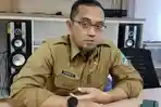 Plt-Kepala-Dinas-Komunikasi-dan-Informatikaa.jpg