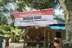 Warga-berjaga-di-posko-sembari-memasang-spanduk-me.jpg