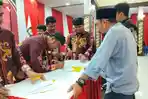 KPU-KTT-menanda-tangani-penetapan-perolehan-suara-Pilkada.jpg