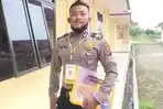 Personel-kepolisian-dari-Polres-Pematangsiantar-bernama-Briptu.jpg