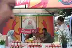 mantan-wali-kota-palu-rusdi-mastura-saat-mengunjungi-gerai-usaha-kecil.jpg