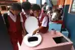 Toilet Pengompos Solusi Mengurangi Limbah Kotoran di Sungai