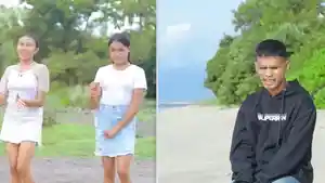 Martin-Kurman-membawakan-lagu-Raja-Mauboli-dan-dua-model-penari-latar.jpg