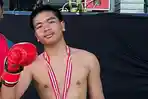 Yoza-Mahendra-siswa-SMAN-2-Siak-Kejuaraan-Kick-Boxing-LPPD-Street-Fight-Dumai.jpg