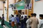 Masyarakat Gampong Bayu Khatam Al-Quran dan Santuni Anak Yatim