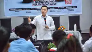 CHRISTIAN-WIDODO-UU-PERAMPASAN-HAK.jpg