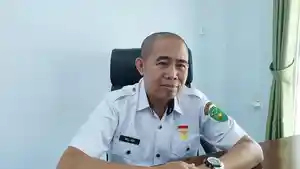 Kepala-Dinas-Kelautan-dan-Perikanan-Kota-Will-Hopi.jpg