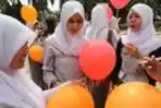 Lepas Balon Usai UN SMAN 1 Palembang