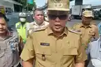 Plt-Wali-Kota-Bekasi-imbau-warga-mudik-lebaran-lapor-ke-RTRW.jpg