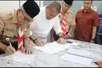 Teken-Perjanjian-Hibah-Daerah-untuk-Pramuka.jpg