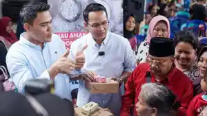 TKD-Prabowo-Gibran-surabaya-bagi-makan-siang-dan-susu-gratis.jpg