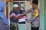 Kapolres-Probolinggo-AKBP-M-Wahyudin-Latif-memberikan-bantuan-pada-warga-terdampak-gempa.jpg