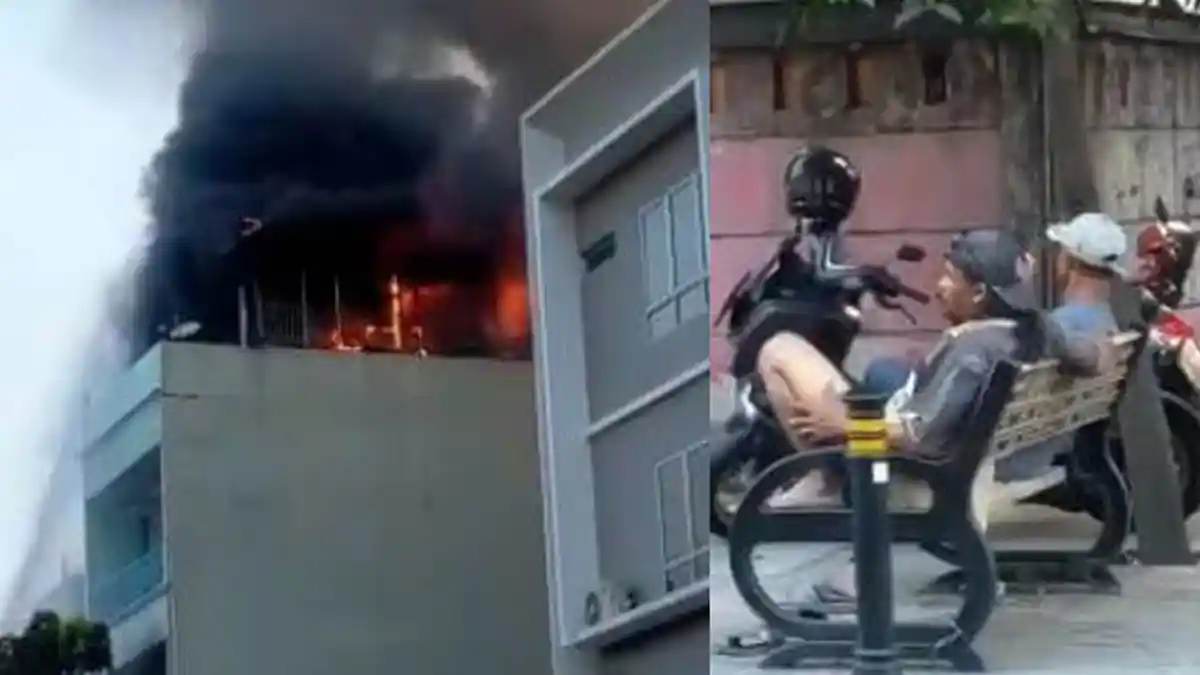Viral Gedung Kebakaran, 2 Pria Ini Duduk Santai, Warganet Sebut Mereka Berasa Nonton Layar Tancap