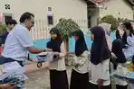 Gramedia Berbagi Kado di HUT Ke-56, Gramedia Jambi Bagi Buku Bacaan ke Siswa SD