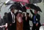 Jokowi dan Raja Salman Tembus Hujan Lebat di Istana Bogor