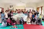 20260616-SELAMAT-KAMPUNG-Suasana-khidmat-puluhan-warga-di-balai-Kantor-Desa-Lalang-Jaya.jpg