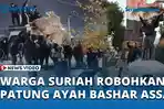 Detik-detik-Warga-Suriah-Robohkan-Patung-Ayah-Bashar-Assad.jpg