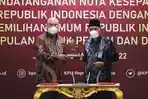 Ketua-KPU-RI-Ilham-Saputra-bersama-Direktur-Pemberitaan-Tribun-Network-Febby-Mahendra-Putra.jpg