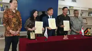 MoU-IRIJJ-dengan-USB.jpg