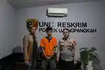 Tampang-MDR-tengah-diamankan-Polsek-Ujungpangkah-usai-membobop-rumah-tetangganya.jpg