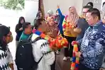 Sambutan-atlet-NPCI-Riau-saat-tiba-di-Pekanbaru.jpg
