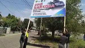 Babinsa-pasang-baliho-usir-narkoba.jpg