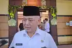 Bupati-Malang-Sanusi-pungutan-liar-KTP-dan-KK.jpg