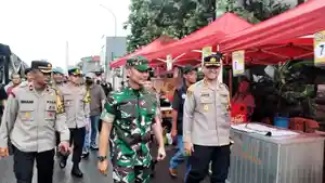 Kapolres-Metro-Depok-Kombes-Arya-Perdana-kanan-bersama-Dandim-0508Depok.jpg