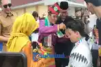 Warga dan Pemda Sambut Kedatangan Dzaky Atlet Kapuas Hulu Raih Medali Emas ASEAN Para Games Thailand
