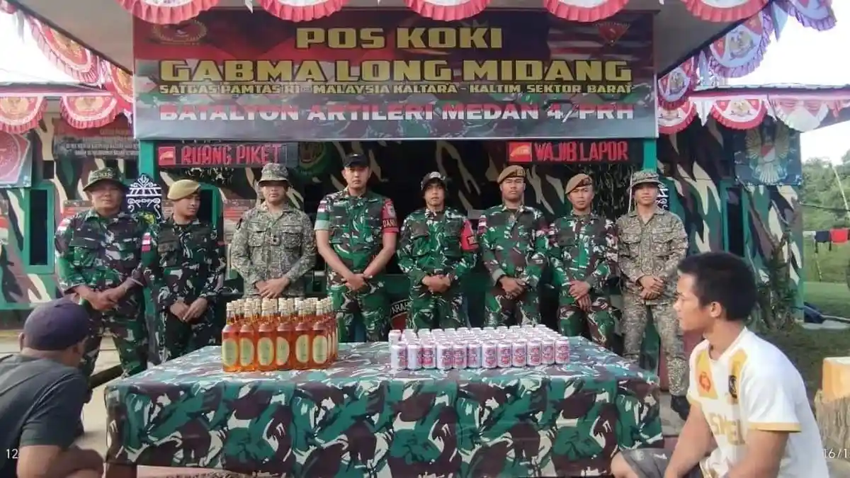 Modus Kardus Air Mineral Terbongkar, Satgas Pamtas Yonarmed 4/Parahyangan Amankan 92 Botol Miras