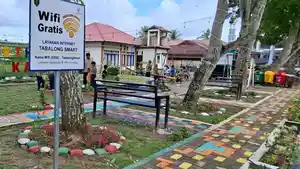 Plang-layanan-wifi-gratis-yag-sudah-terpasang-di-RTH-Smart-Desa-Kapar-Tabalong.jpg