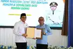 Serah-terima-SK-dan-Surat-Tanda-Register-STR-Posbakum.jpg