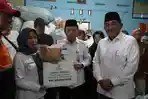 Gubernur-Jambi-Al-Haris-turun-langsung-menyambangi-korban-kebakaran-di.jpg