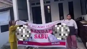 20260613-Emak-emak-geruduk-rumah-bandar-narkoba.jpg