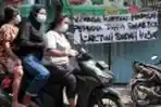 Spanduk Peringatan untuk Pemudik yang Kembali ke Jakarta