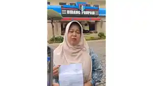 Saidatul-Fitri-istri-dari-tersangka-MK-dalam-dugaan.jpg