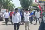 Ratusan-massa-lintas-parpol-pengusung-mengantarkan-pasangan-Lukman-Hakim.jpg